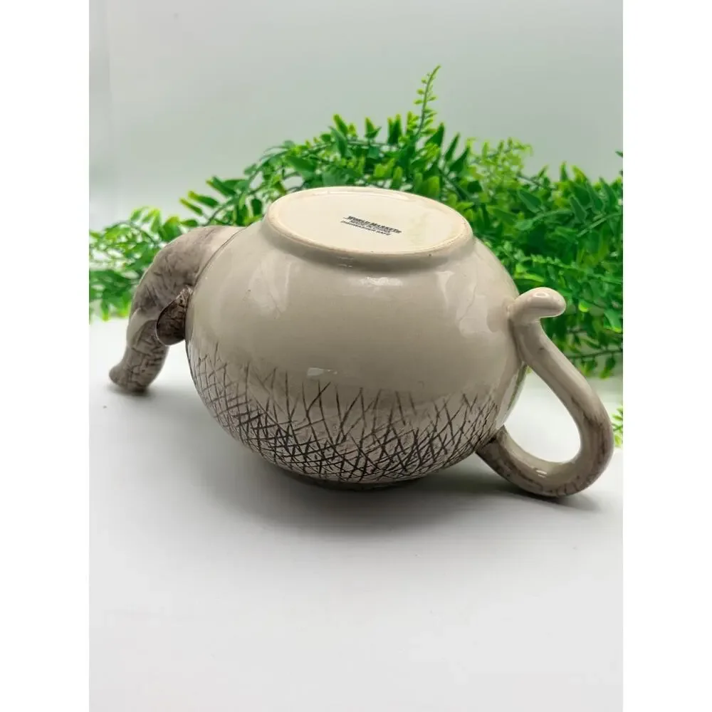 Vintage world market elephant tea pot.